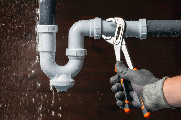 Professional Drain Cleaning technician working in Rego Park, NY